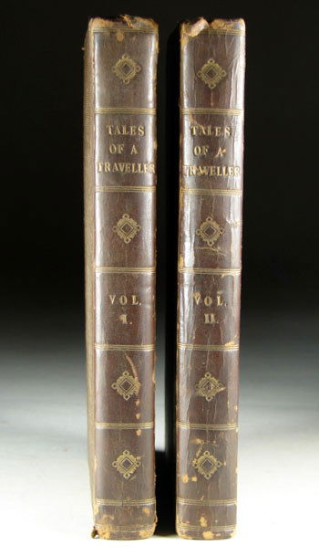 Irving. Tales of a Traveller, 2v, 1824: Irving, Washington (as Geoffrey Crayon). Tales of a Traveller. London: John Murray. Two volume set. Half leather binding with brown cloth boards. Gilt titles and motifs on spine. Some rubbing and chip