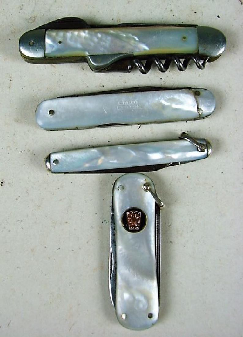 2 Remington UMC Pocket Knives: with pearl handles. Larger has one side that is cracked. As well as a Schrade Masonic knife with pearl and a A.J. Jordan 3 blade and cork screw with pearl. All show wear from use. Rust and minor pitti