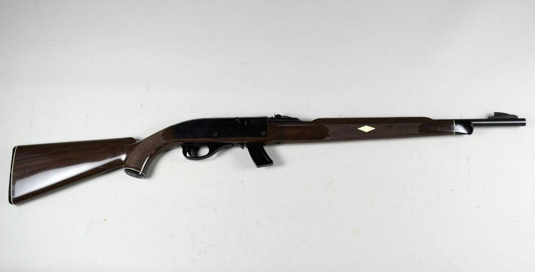Remington Model Mohawk 10C Rifle*: in .22 long rifle. Overall 98% finish with a few minor spots of rust. Bore is excellent, plastic stock shows crazing in finish with minor scratches. Has extra magazine. Barrel 19 1/2", overall 38 1/2"