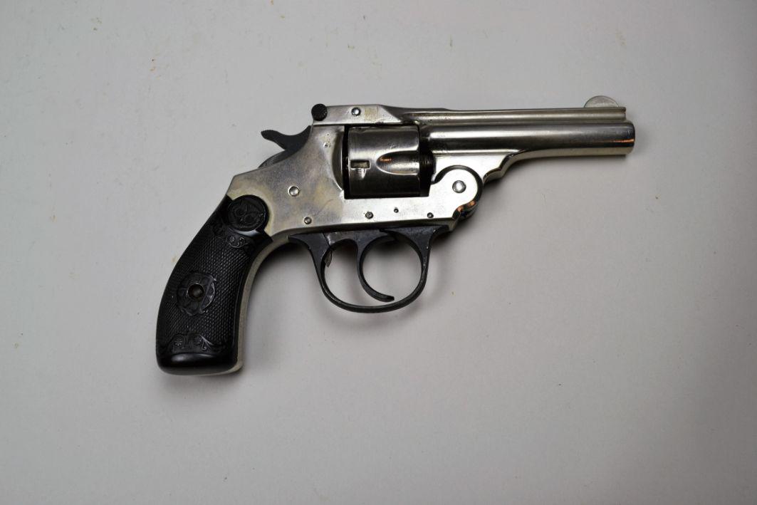 Iver Johnson Top Break Double Action Revolver*: in .32 caliber. Renickled and other parts finished black. Shows pitting under the finish. Bore is good with heavy pitting. Hard rubber grips show light wear. Left grip is chipped on bottom edge. Barre