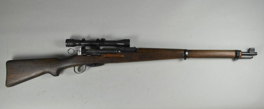 Swiss Model 1931 Short Rifle*: in 7.5 x 55. Import marked. Approximately 90% finish with balance grey. Bore is very good. Stock has been refinished. Mounted with a Kollmorgen 4x scope Serial #13348 with Talley mount. Small dents on