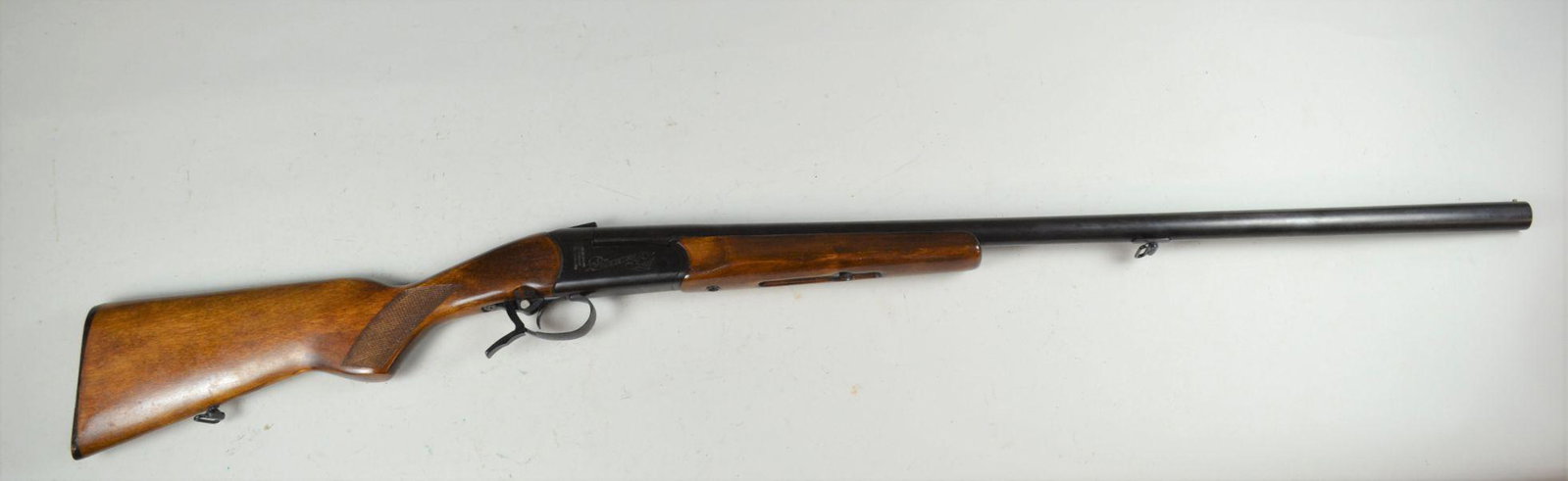 Russian Baikal Model 18M Shotgun*: in 12 ga. Importer mark on receiver. Overall 98% finish with excellent bore. Stock is excellent with minor storage wear. Barrel 28 1/2", overall 44 1/2" *Registration is required