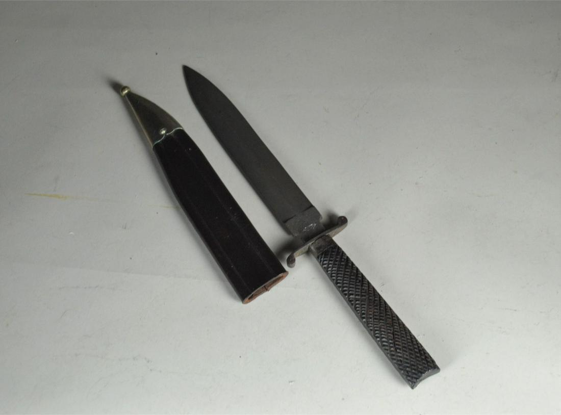 Rare Circa 1850 Rose New York Spear Point Side Knife: with iron cross guard and Gutta Percha grips. Grips are cracked and repaired. Blade is marked Rose New York and has moderate pitting. Has incorrect modern scabbard. Blade: 6 1/2" long, overall 11" lon