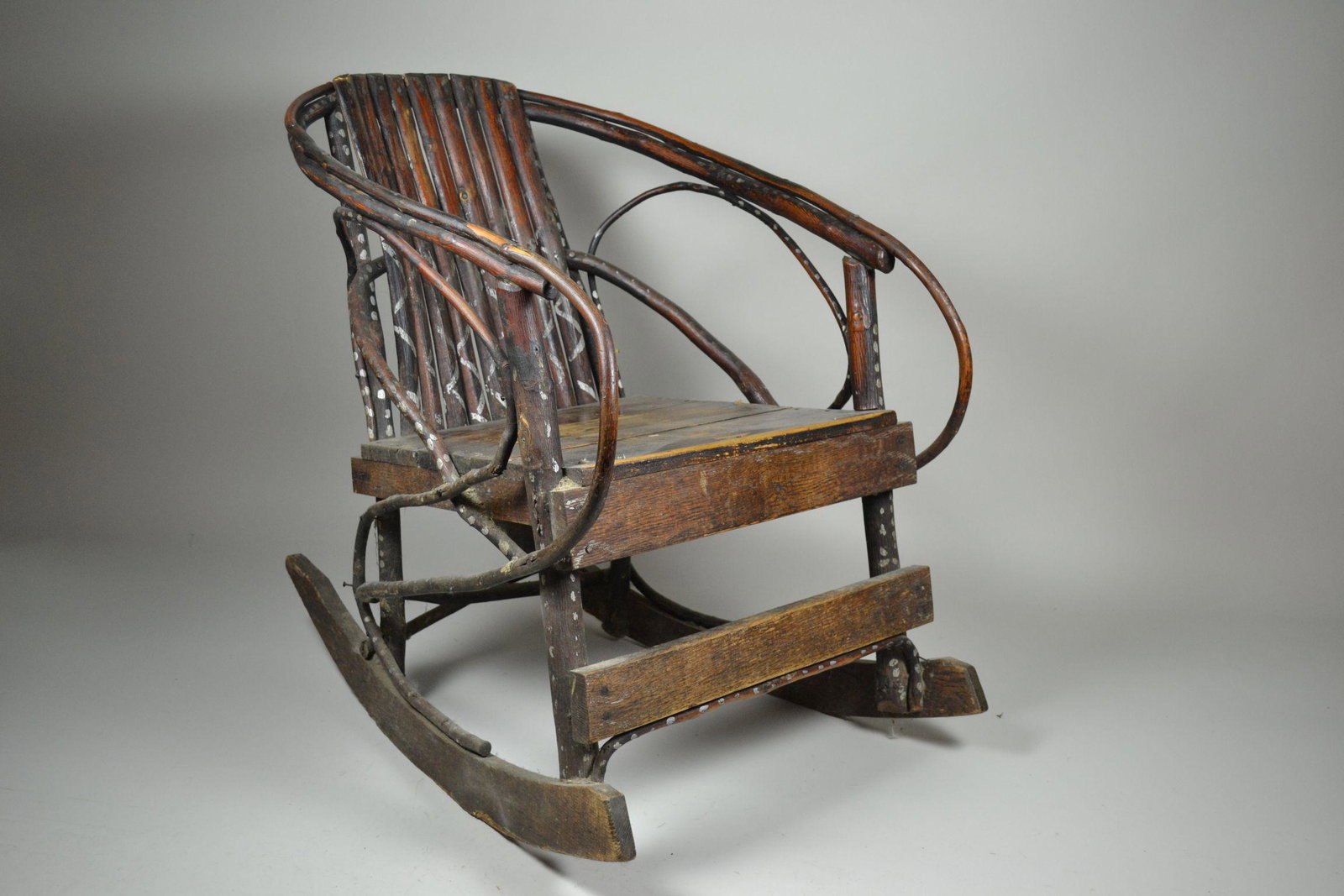 Paint Decorated Twig Rocker: early 20th Century. Hickory and ash, good patina and wear. 30" h x 21" w x 30" d