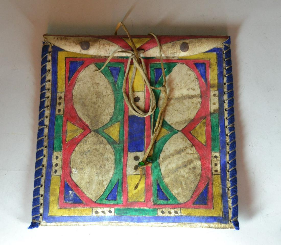 Rawhide Paint Decorated Bag: edges are wrapped in felt and sewn with sinew. Minor wear. 10" h x 10" w