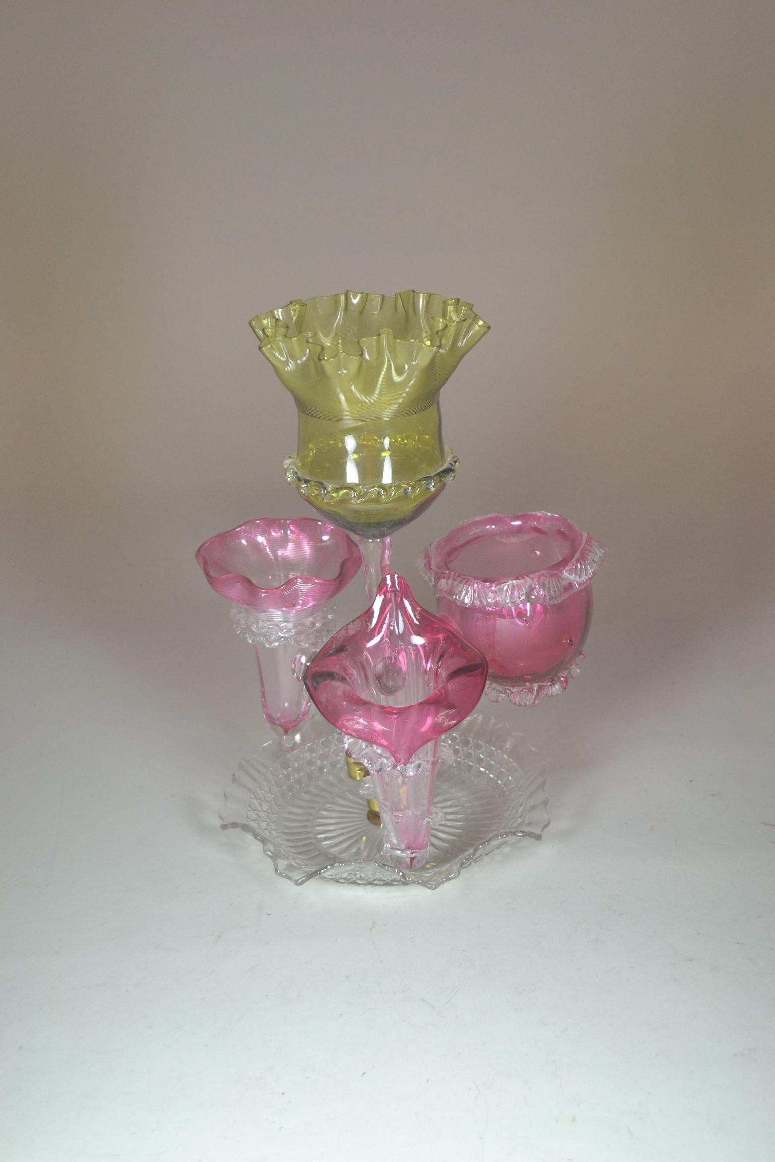 Art Glass Epergne: hand blown with each of the four inserts being unique shapes of cranberry and olive green. 13" h x 8" w
