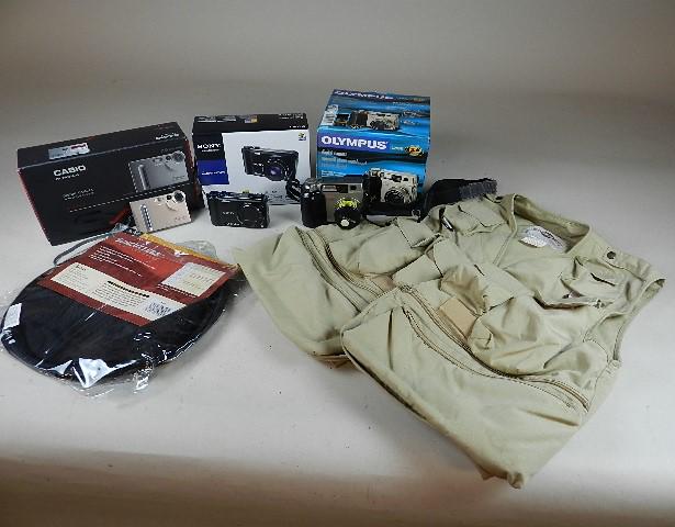 Cameras: Olympus Digital Camera, Sony Cyber Shot 10.2 mega pixels, Casio EXS2 Digital Camera, professional photographer's vest & sun screen