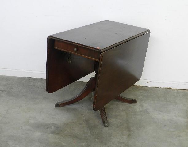 Mahogany Drop Leaf Table: Duncan Phyfe style with 2 drawers. Wear to finish, 29" h x 21" w x 38" d