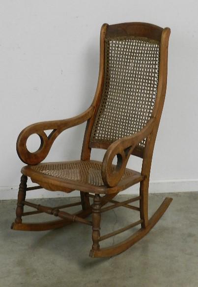 Antique Rocker: with cane back and bottom, with burl decoration, 40" h