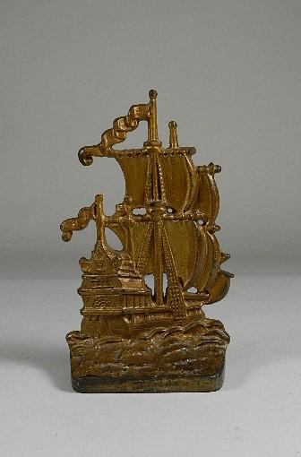 Cast Iron Ship Door Stop: marked on back, 9" h