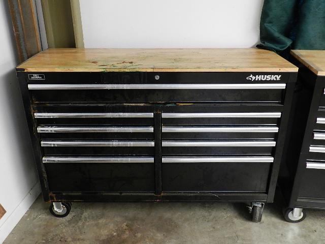 Husky Tool Box: appears to had a corrosive spilled on it