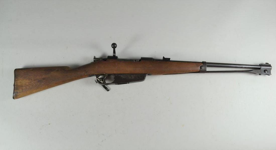 Italian Model 1938 Calvary Carbine*: in 6.5, Serial # SF1002. Approximately 60% finish. Bore is good with pitting. Stock is very good with several cracks, full unit marks. Bolt needs to be reworked and doesn't function. Barrel 17 3/4", o