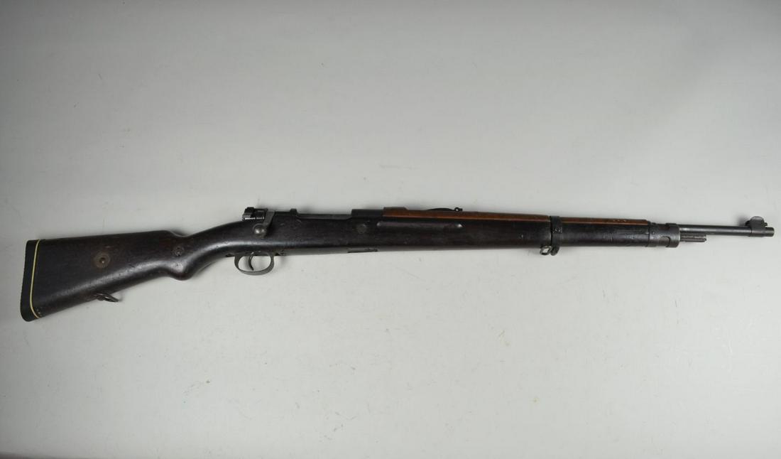 Unmarked Mauser*: in 7.92 x 57, Serial # 36948Z. This is mostly likely a Czech model 24 with all markings removed. Approximately 50% finish. Bore is very good. Stock is very good with heavy bruising. Rubber buttplate a