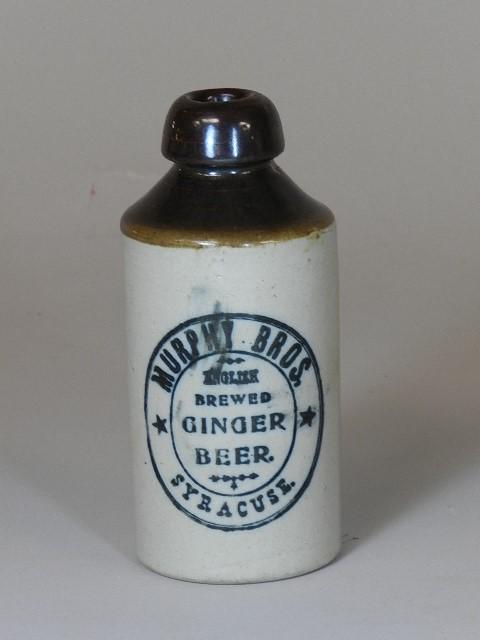 Murphy Brothers Syracuse NY Stoneware Ginger Beer: bottle maker stamp of the Robinson Marrill Co Akron Ohio. Two tiny shoulder chips, otherwise excellent condition, 6 3/4" h