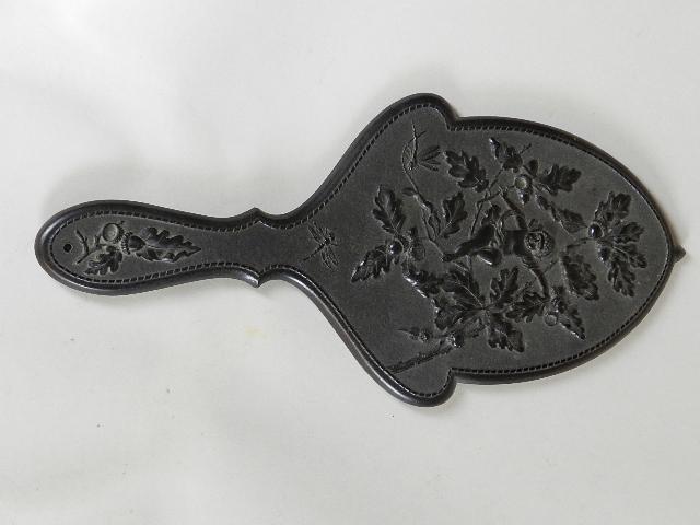Victorian Thermoplastic/Gutta Percha Hand Mirror: patent 1872, cherub and dragonflies. No chips or cracks, minor loss of silver to mirror, 11" h