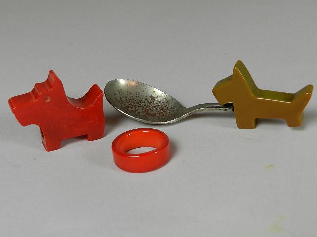 Lot of Bakelite Items: includes: scotty dog pencil sharpener, child's spoon and ring. Rust to spoon, wear from use. Largest 3 1/2" long