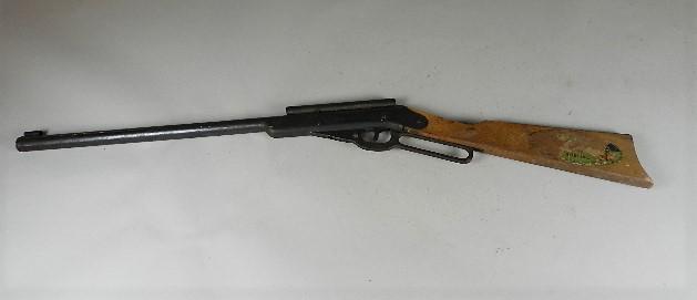 Daisy Model 195 Buzz Barton Special Air Rifle: heavy wear, approximately 50% blue remains, most of decal is gone, still functions. 34" l