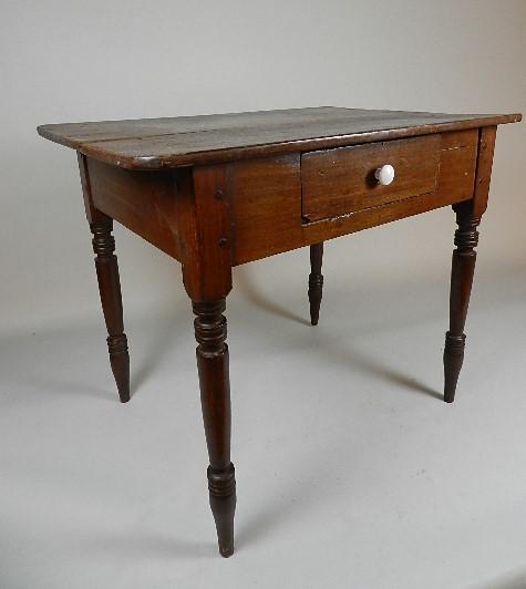 Mid 19th Century Southwest Virginia Work Table: possibly Wythe or Pulaski County, Virginia. Turned legs are pegged, drawer is box construction with cut nails. One board popular top attached with cut nails. Large crack in top. Knob is a replacement,
