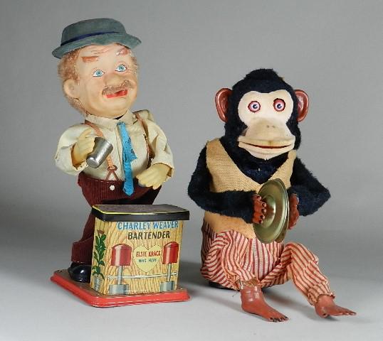 Vintage Battery Operated Toys: Charlie the Bartender, missing glass. Cymbals Monkey is missing the battery door. Wear from use, untested, tallest 12"