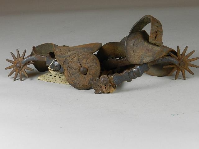 Harry Knight's Spurs: with old tag "These are Harry Knight's Buffalo Bill Show Spurs. Purchased in Tharinx(sic) in year 1891 - used in Buffalo Bill Show from 1900 to 1912 and used on Triangle H.C. Ranch until sold in 1948.