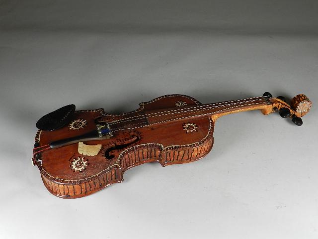 Folk Art Decorated Fiddle: plastic cheek piece, signed on back "Mady by Paul Rurst 1995." Wear throughout, 24" long