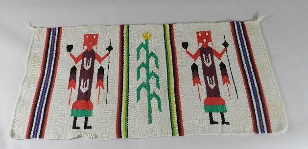 Navajo Hand Woven Wool Yei Rug: has two characters and corn stalk in center. Spider Woman hole above one character's head. 2" spot of damage along one edge. 20 1/2" h x 38 1/2" w