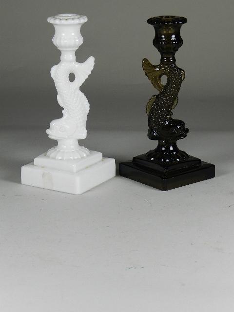 Assembled Pair of Imperial Dolphin Candlesticks: one amber and one milk, glass, 9" h