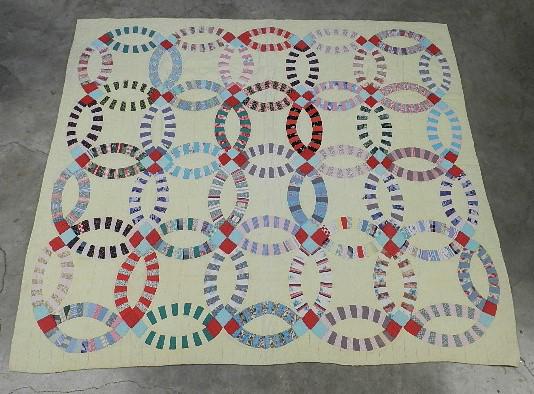 Double Wedding Ring Quilt: has small stain, 73" h x 82" w