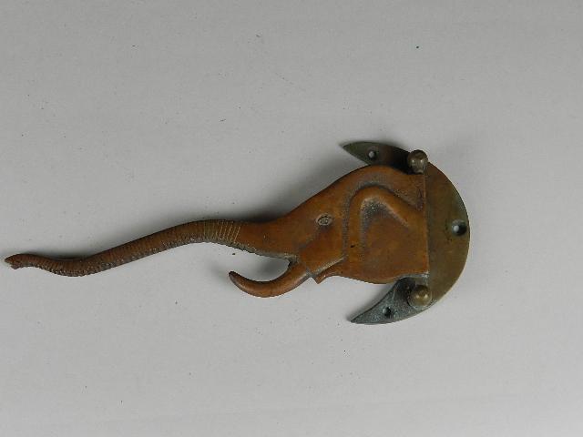 Rare Fold Away Towel Bar: copper elephant head and trunk on a brass crescent moon, 9" w