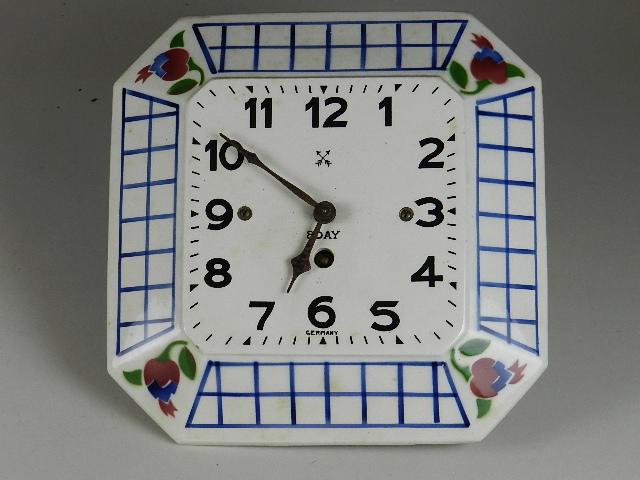 German 8 Day Porcelain Face Kitchen Clock: no key or pendulum, untested, 9" h x 9" w