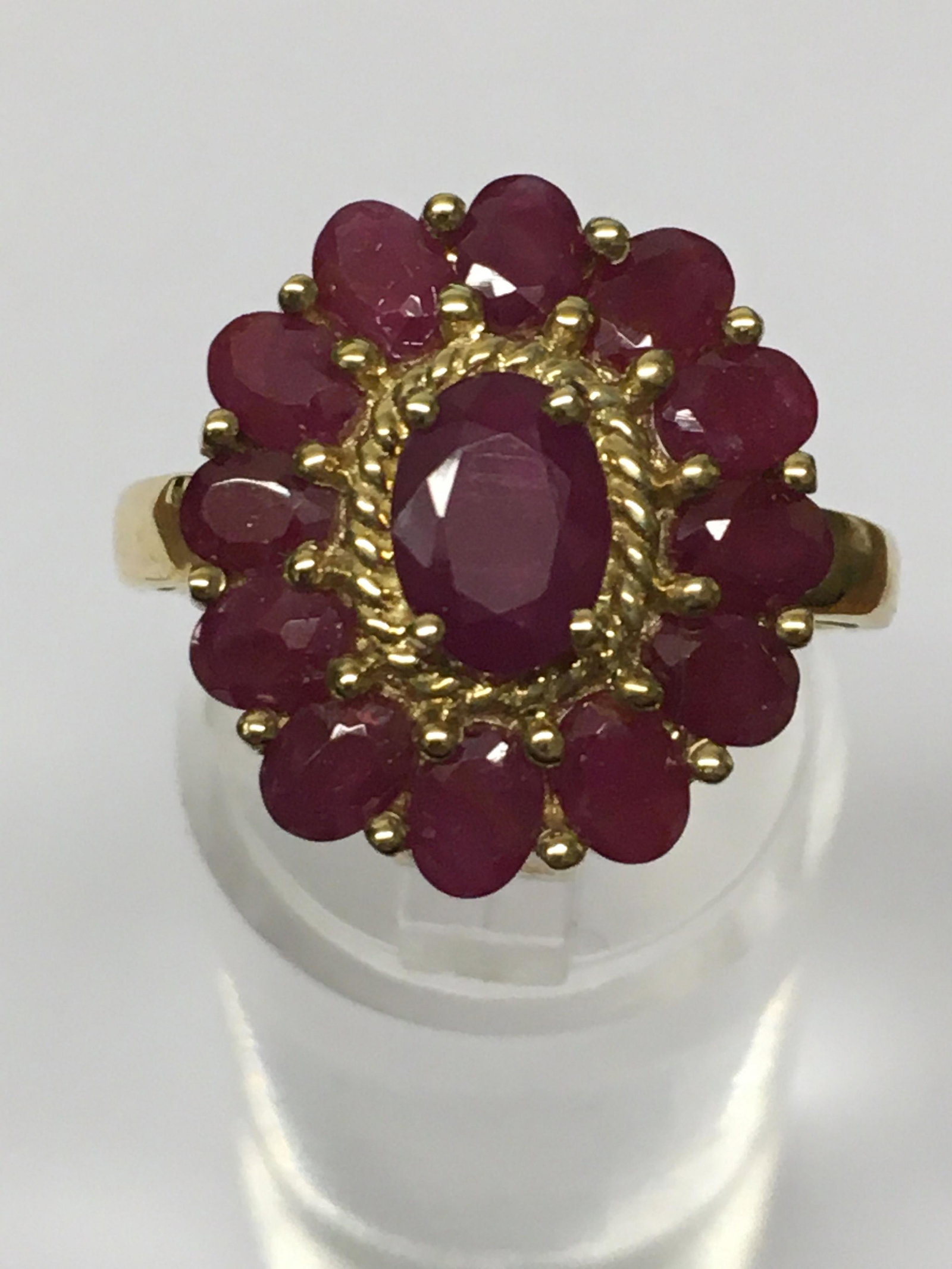 10k Yellow Gold Cocktail Ring: possibly lab created ruby stones, size 7, 4.1 grams tw