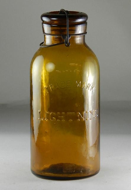 Trademark Lightning Half Gallon Amber Jar: RB# 1489, type 3 lid, minor wear, 9 3/4" h