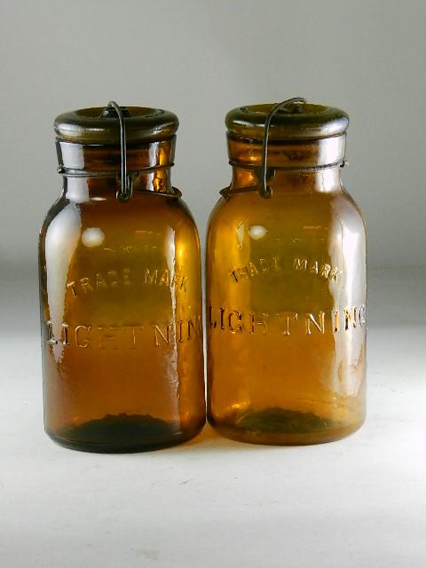 Lot of 2 Trademark Lightning Quart Amber Jars: RB# 1489, type 3 lids, one lid is chipped, 7 1/4" h