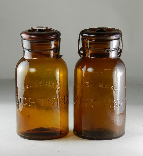 Lot of 2 Trademark Lightning Quart Amber Jars: RB# 1489, type 3 lids, minor wear, 7 1/4" h
