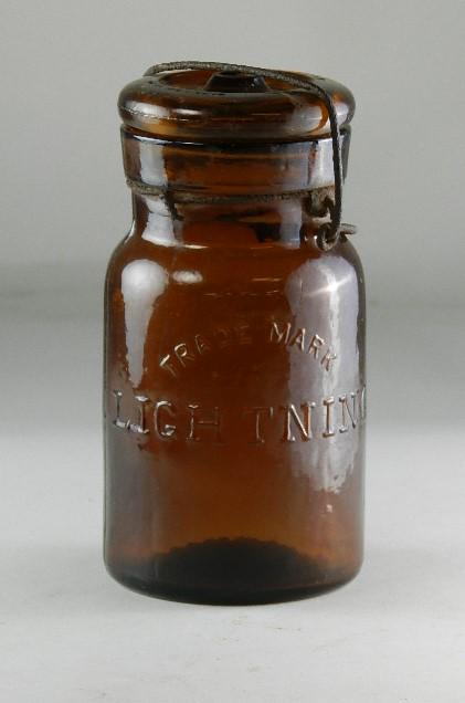 Trademark Lightning Pint Amber Jar: RB# 1489, type 3 lid, closure is rusted, small chip to lid, minor wear, 5 3/4" h