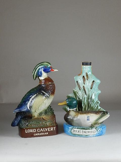 2 Jim beam Bottles: cork is broken on one