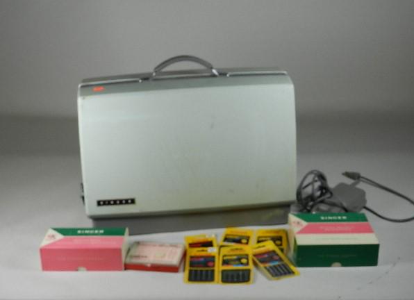 Singer Sewing Machine: with attachments