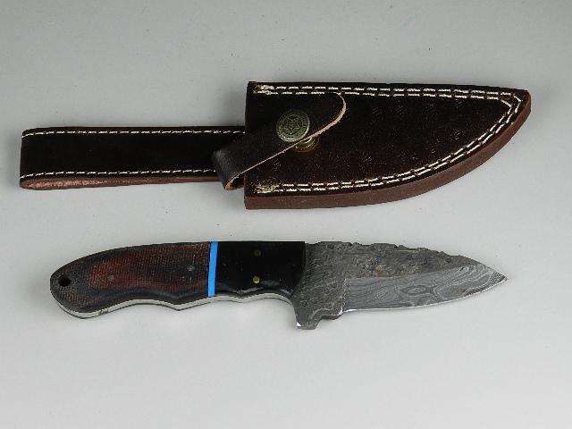 Damascus Blade Skinning Knife: with composite grips, blade 3 1/4", overall 7 1/2"