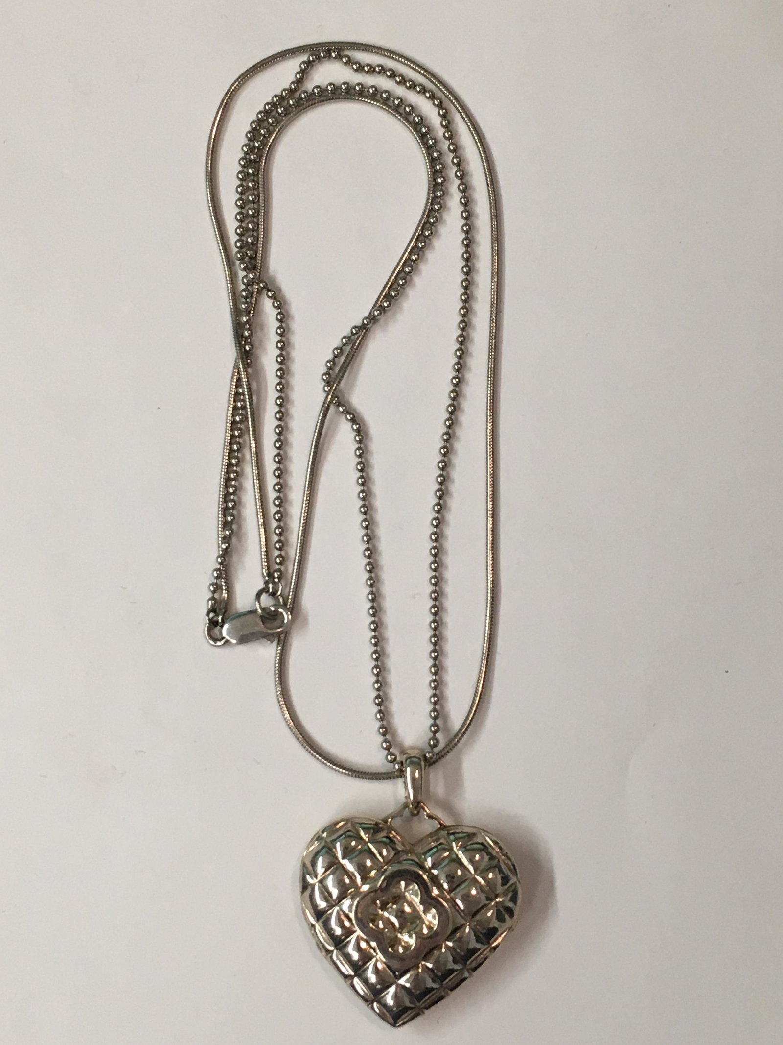 Heidi Klum Sterling Heart Locket Pendant Necklace: 15" long chain, pendant is 1" h