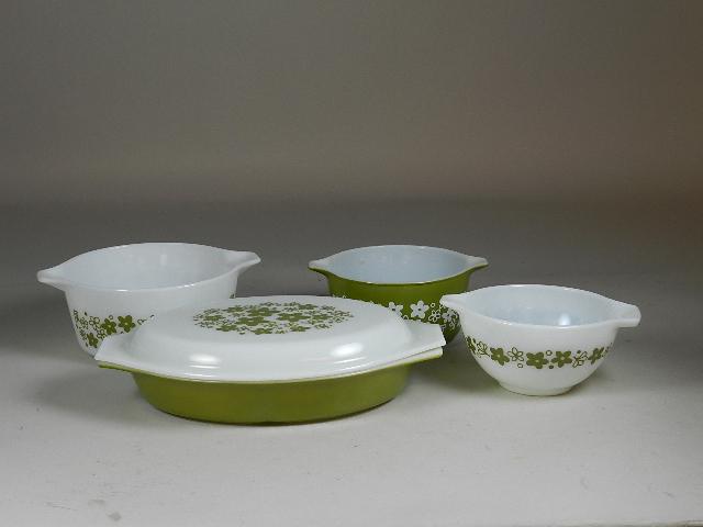5 Pieces of Vintage Pyrex: Spring Blossom Green Crazy Daisy Pattern. One divided casserole dish with lid and three bowls
