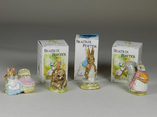 4 Piece Beswick Beatrix Potter Figurines: "Goody Tip Toes", "Fierce Bad Rabbit:, "Old Mr. Prickle Pin", "Huncha Munch", with 3 boxes, tallest is 4 1/2"h