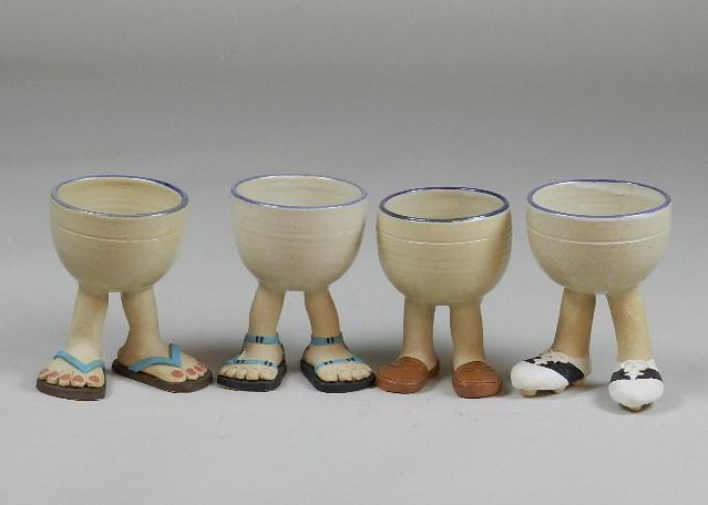 Four Pottery Footed Cups: signed on bottom, 4" h x 3" w