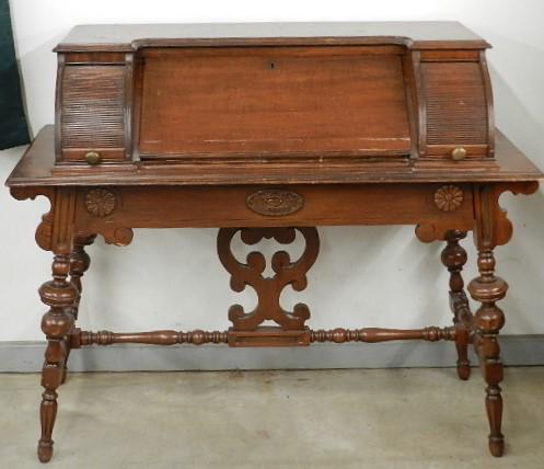 Slant Lid Writing Desk with Side Tambers: has wear and veneer damage, 38" h x 44" w x 19" d
