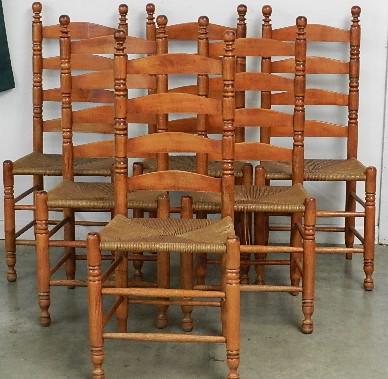 Set of Six Ladder Back Chairs: rush bottom seats, wear and damage to some seats, 40" h