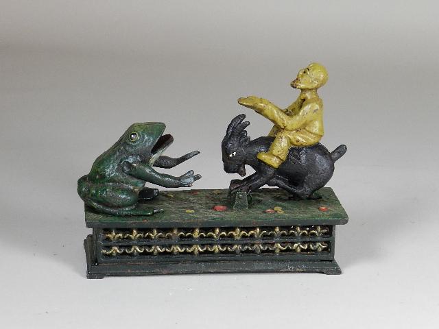 Hubley Reproduction Mechanical Bank of Man on Goat (1 of 10)