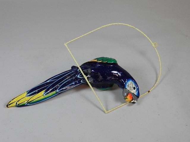 Paper Mache Parrot on Wire Stand: signed J. Murguia, chip on foot, parrot is 19" h