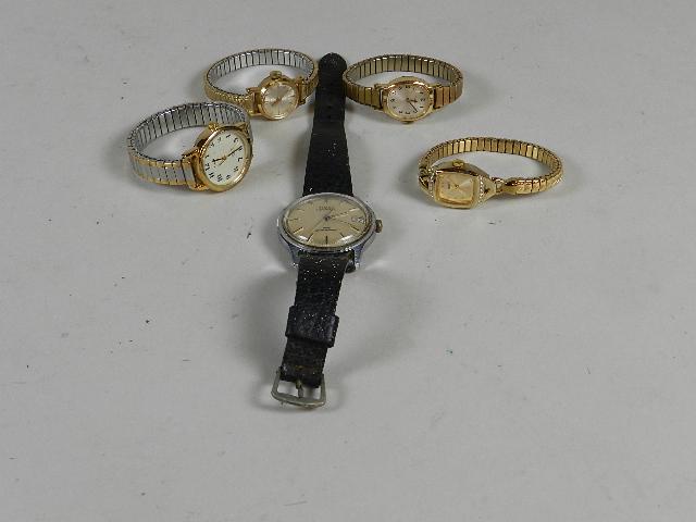 5 Vintage Wristwatches: including a men's Timex Automatic (runs but not guaranteed), wear from use