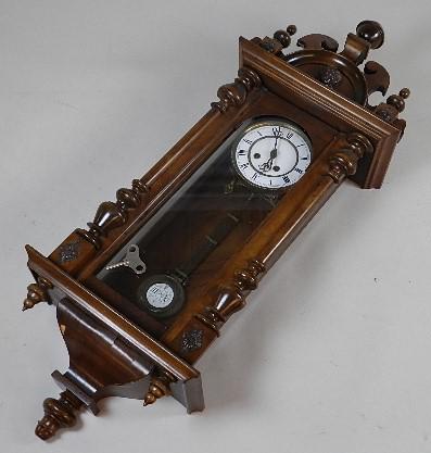 Victorian Hanging Wall Clock: has been refinished, areas of veneer damage along bottom edges, has key and pendulum, untested, 38" h x 15" w x 7" d