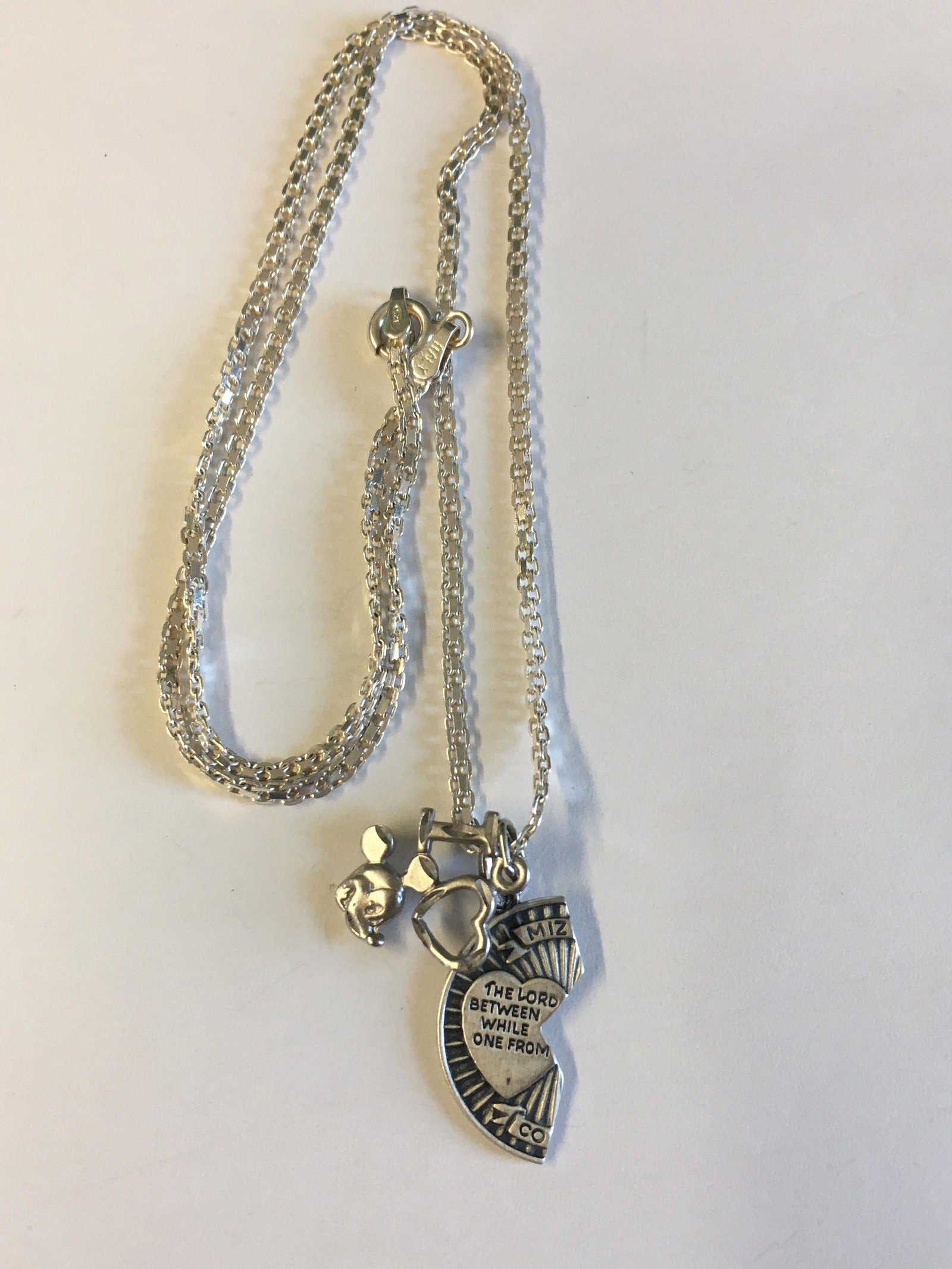 Sterling 2 Pendant Necklace: one pendant is a I love Mickey Mouse, the other is part of a Miz Pah coin pendant necklace, chain: 18"