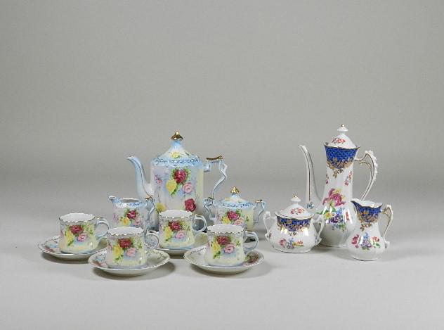 Two Tea or Chocolate Sets: each has pot, 2 cups, 2 saucers, cream and sugar. One is hand painted Nippon, wear from use, tallest: 9"
